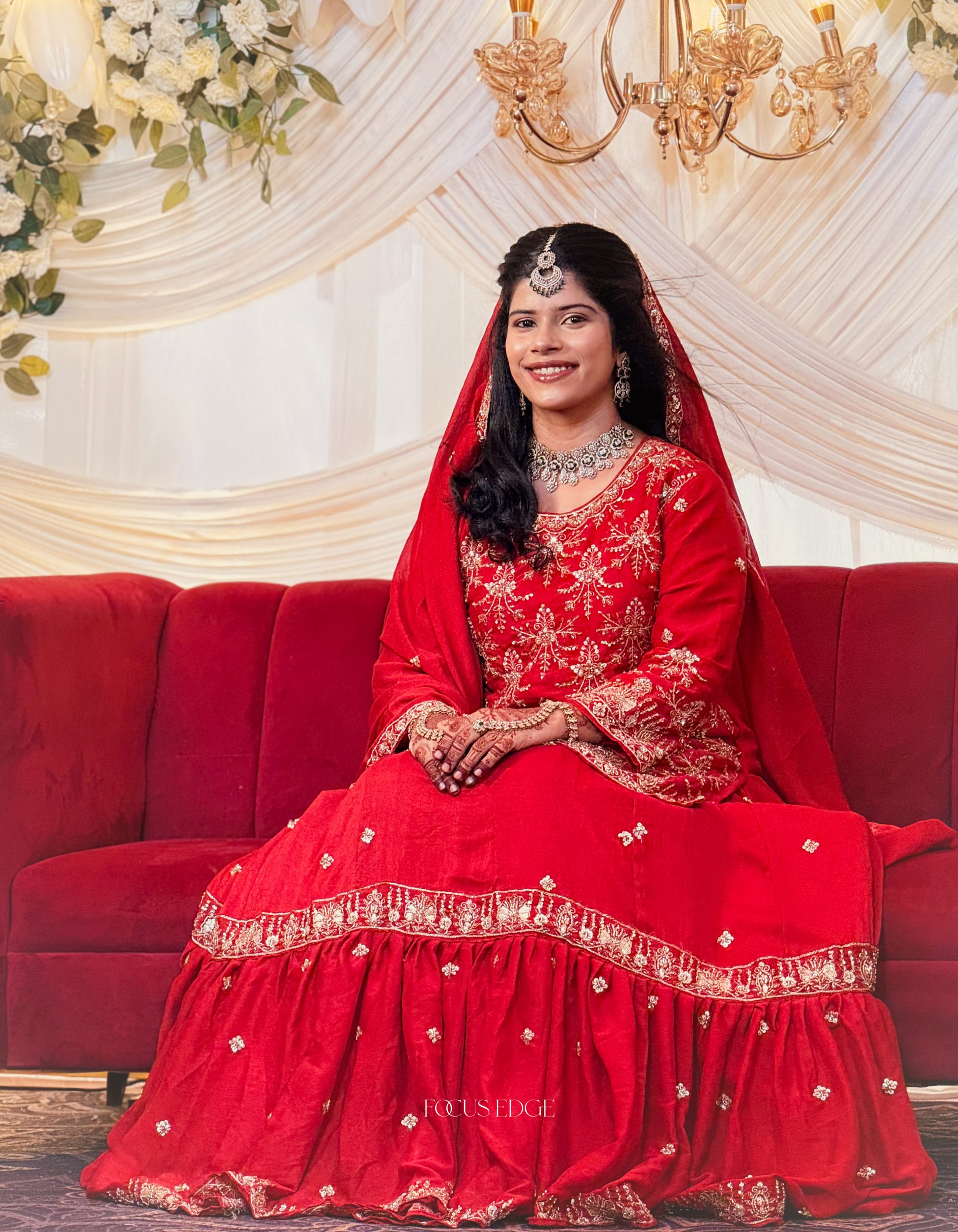 The glow of happiness looks beautiful on her.